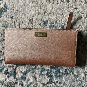 Kate Spade rose gold slim bifold wallet